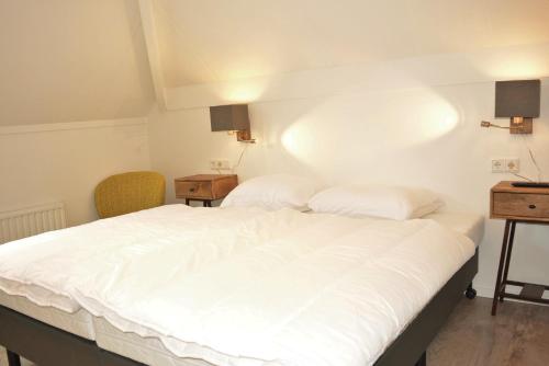 Postel nebo postele na pokoji v ubytování DN120 - Modern apartment with spacious roofterrace