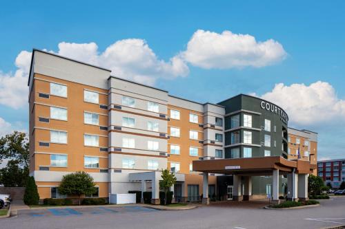 a rendering of a building in a parking lot at Courtyard by Marriott Charleston Downtown/Civic Center in Charleston