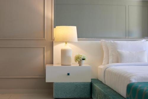 Pomegranate Wellness Spa Hotelにあるベッド