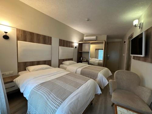 Ένα ή περισσότερα κρεβάτια σε δωμάτιο στο Line Suite Hotel