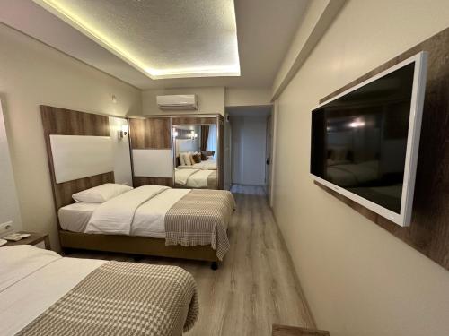 Ένα ή περισσότερα κρεβάτια σε δωμάτιο στο Line Suite Hotel