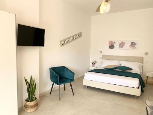 Postel nebo postele na pokoji v ubytování B&B Jolie Suite