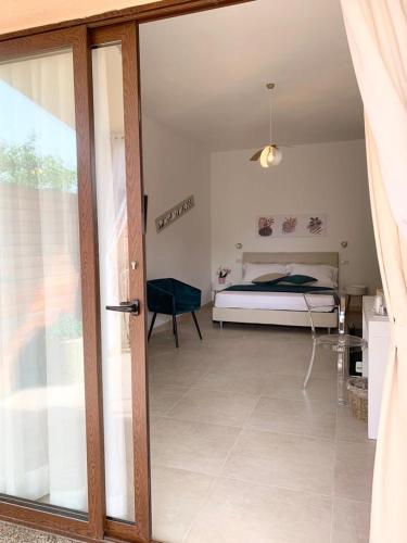 Postel nebo postele na pokoji v ubytování B&B Jolie Suite