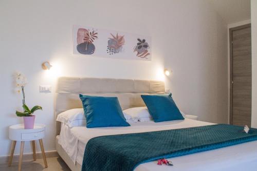 Postel nebo postele na pokoji v ubytování B&B Jolie Suite