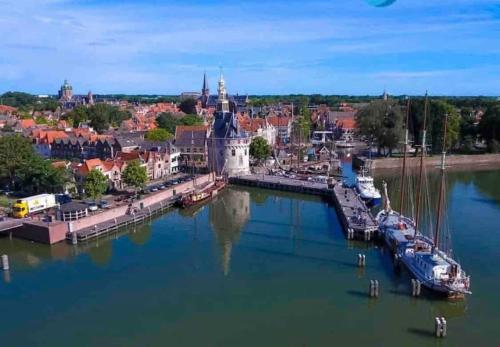 an aerial view of a river with a city at City-beach apartment nearby Amsterdam in Hoorn