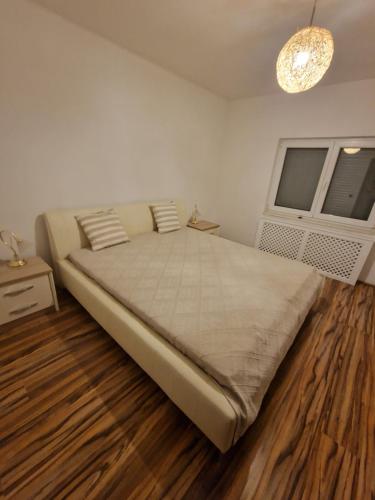 Säng eller sängar i ett rum på Villa Djokovic