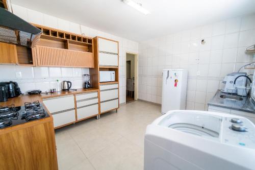 Kuchyň nebo kuchyňský kout v ubytování Casa,Varanda,Churrasqueira,Até 9 Hóspedes,JrCatito