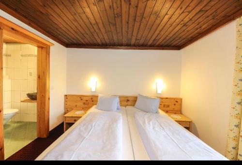 Katil atau katil-katil dalam bilik di Pension Hochwart Hof