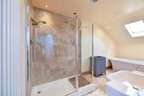 a bathroom with a shower and a sink at Pladda View in Ayr