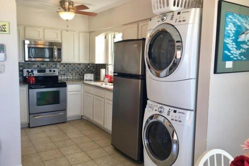 a kitchen with two washer and dryer at North Shore Duplex #54588 Duplex in Anna Maria