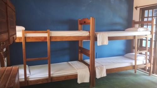 Voodi või voodid majutusasutuse Morro Hostel e Pousada toas