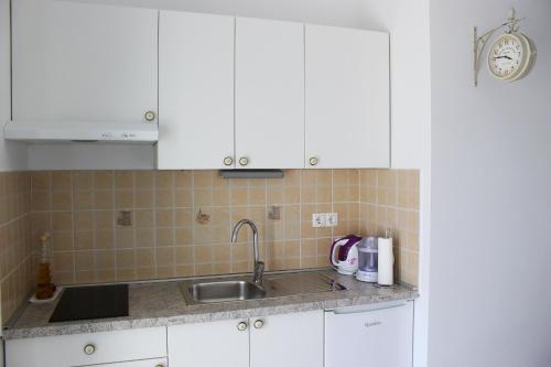 Dapur atau dapur kecil di Apartments Palma