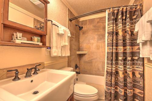 a bathroom with a sink and a toilet at Yellowstone Gateway Inn in Gardiner