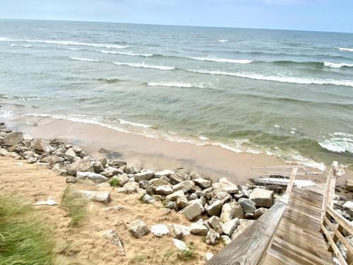 a boardwalk on the beach near the ocean at Indoor Pool near Grand Haven with Lake Michigan Beach! in Norton Shores