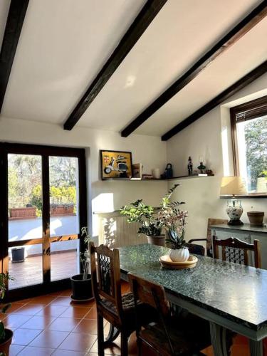 a dining room with a table and some chairs at Apartment in Villa La Carruba in Rivergaro