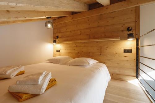 Postel nebo postele na pokoji v ubytování Chalet Bio Corti Spa 4 personnes
