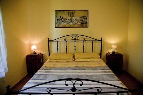 En eller flere senge i et værelse på Agriturismo Tenuta Sol Alto