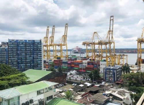 a view of a harbor with cranes at Apartamento Buenaventura in Buenaventura