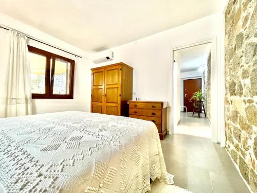 Postel nebo postele na pokoji v ubytování Charming Bari Sardo