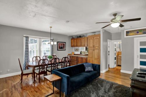 a living room with a couch and a table at 1940 cottage seen on FYI, 2bd 2ba in Gainesville