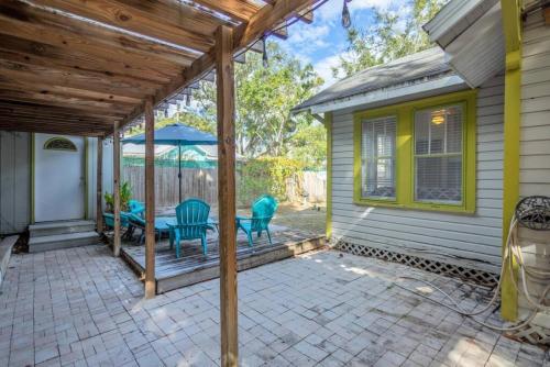 a patio with a table and chairs on a house at 1940 cottage seen on FYI, 2bd 2ba in Gainesville