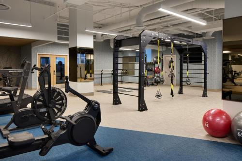 a gym with a treadmill and a exercise bike at The Westin DC Downtown in Washington, D.C.
