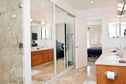 a bathroom with a shower and a sink at HUGE Open Concept Living in Best Location in San Francisco