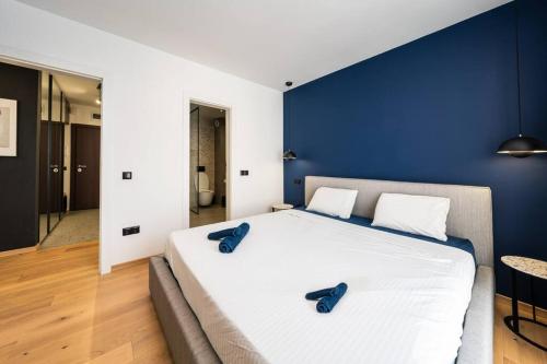 Ένα ή περισσότερα κρεβάτια σε δωμάτιο στο Vitosha Apartment With Parking