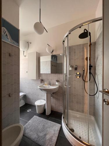 a bathroom with a shower and a sink at LOFT29 Design home near the Vatican in Rome