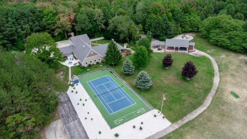 an overhead view of a tennis court on a house at Indoor Pool Near Grand Haven & Lake Michigan Beach in Spring Lake