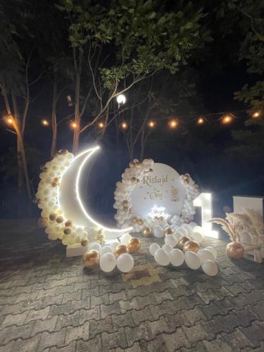 a display of a night scene with a moon at Hotel Aroma in Përmet