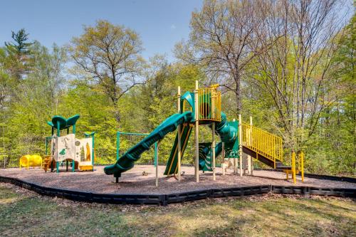 a playground with a slide in a park at Inviting Bartlett Condo 1 Mi to Attitash Mountain in Bartlett