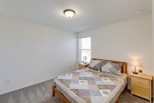 a bedroom with a bed and a window at Manor Vacation Rental with Yard 17 Mi to Austin! in Manor
