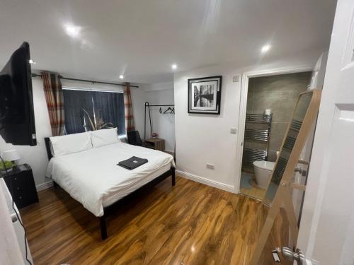 Postel nebo postele na pokoji v ubytování Tarleton Guesthouse