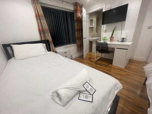 Postel nebo postele na pokoji v ubytování Tarleton Guesthouse