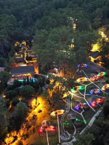an overhead view of a park at night at Olympos Village Relaxury Hotel in Olympos