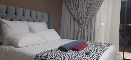 Cama ou camas em um quarto em Soma Guesthouse