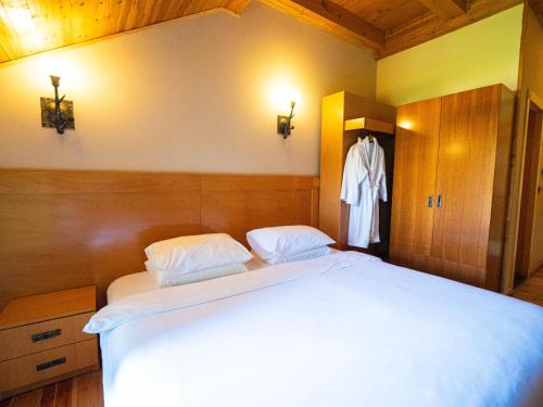 Postel nebo postele na pokoji v ubytování Natyral Razma Resort