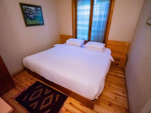 Postel nebo postele na pokoji v ubytování Natyral Razma Resort