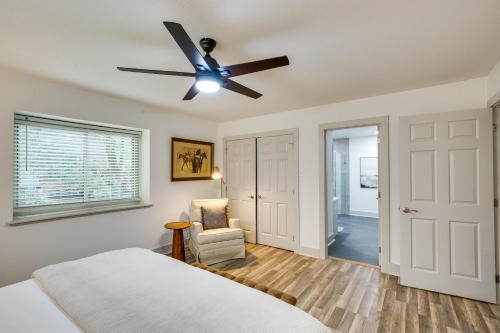 a bedroom with a bed and a ceiling fan at PickleballandSport Court Spacious Kemp Home! in Kemp