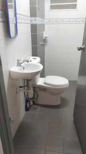 a bathroom with a sink and a toilet at RIZQI HOMESTAY PRIMA PRESINT 11 PUTRAJAYA in Putrajaya