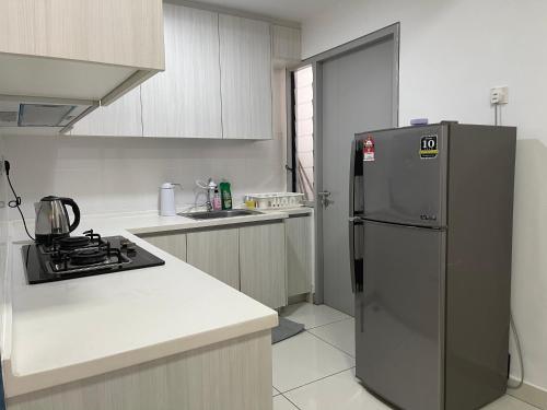 Η κουζίνα ή μικρή κουζίνα στο 1Tebrau Southkey Midvelly By Affinity Johor Bahru