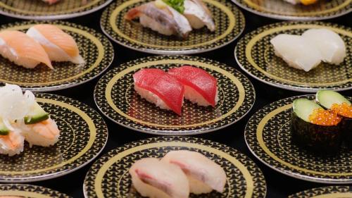 a bunch of food on plates on a table at O2 capsule house OTARU in Otaru