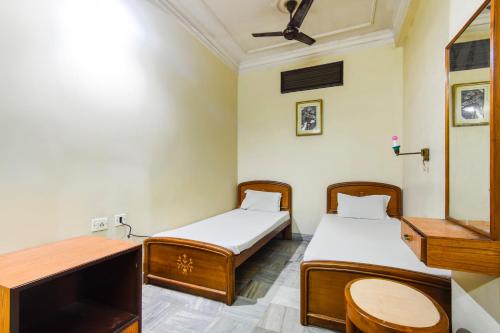 Katil atau katil-katil dalam bilik di Super Hotel O Ajanta