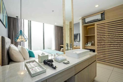 Katil atau katil-katil dalam bilik di Lovely Room Oceanami Resort