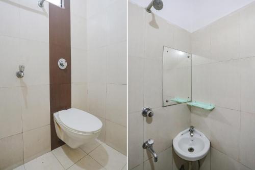 a bathroom with a toilet and a sink at FabExpress Greenstar Inn - Bhubaneswar Airport in Bhubaneshwar