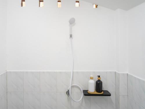 Ένα μπάνιο στο Sand Beach Bungalow