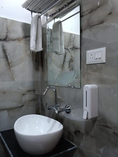 Un baño de Gulmarg Residency