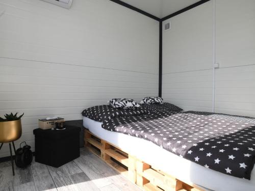 Postel nebo postele na pokoji v ubytování Beautiful tiny house in the Waldviertel