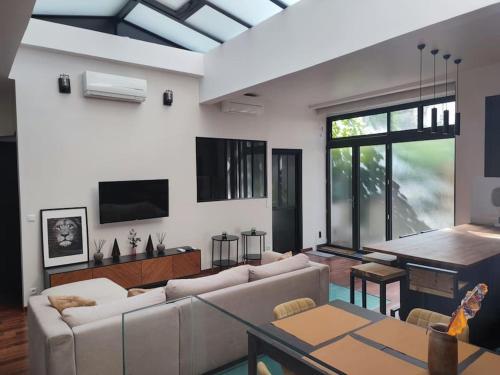 Loft Paris centre face au parc des buttes Chaumont